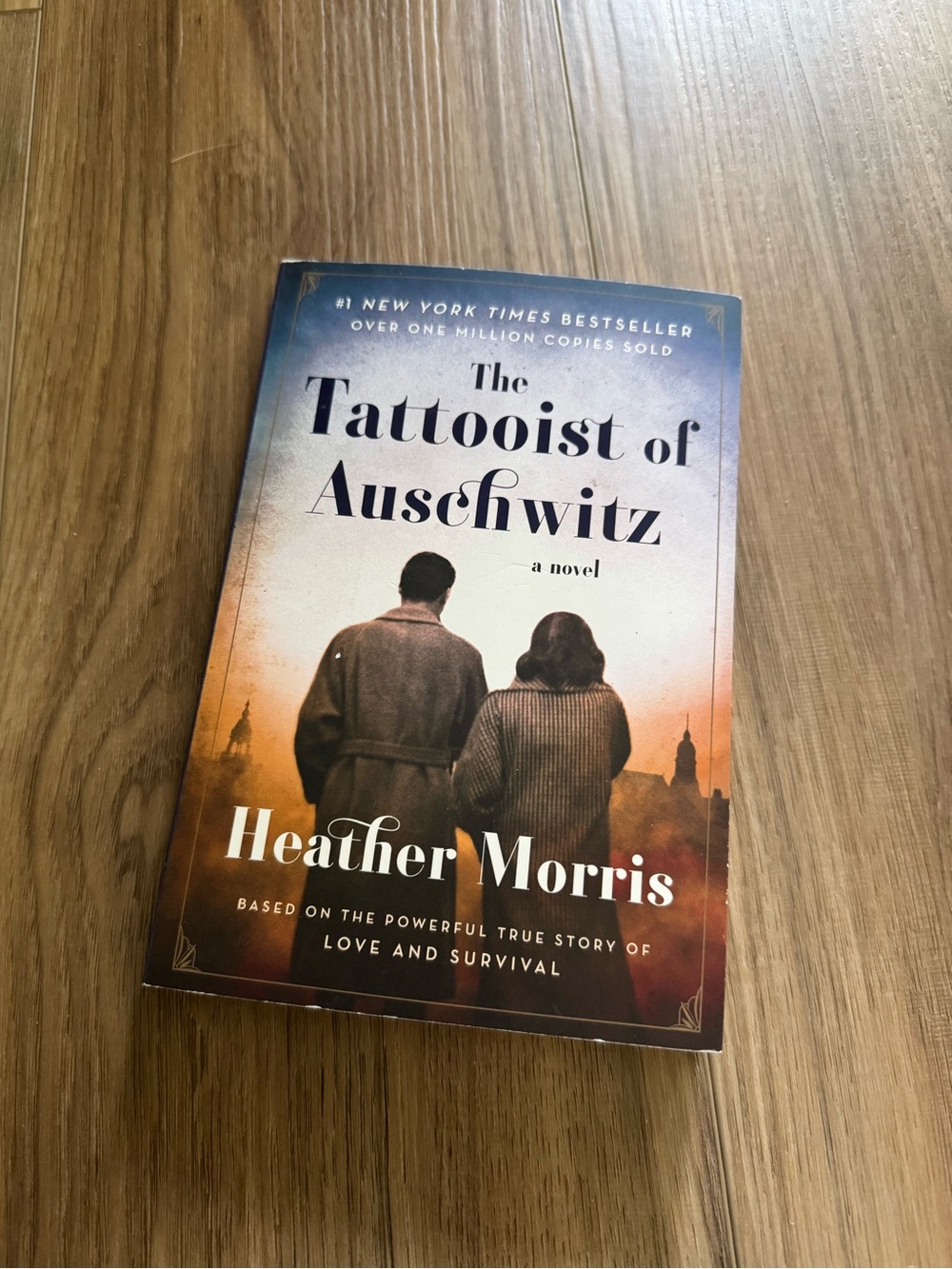 The Tattooist of Auschwitz by Heather Morris - Sunset Beige/Blue Cover